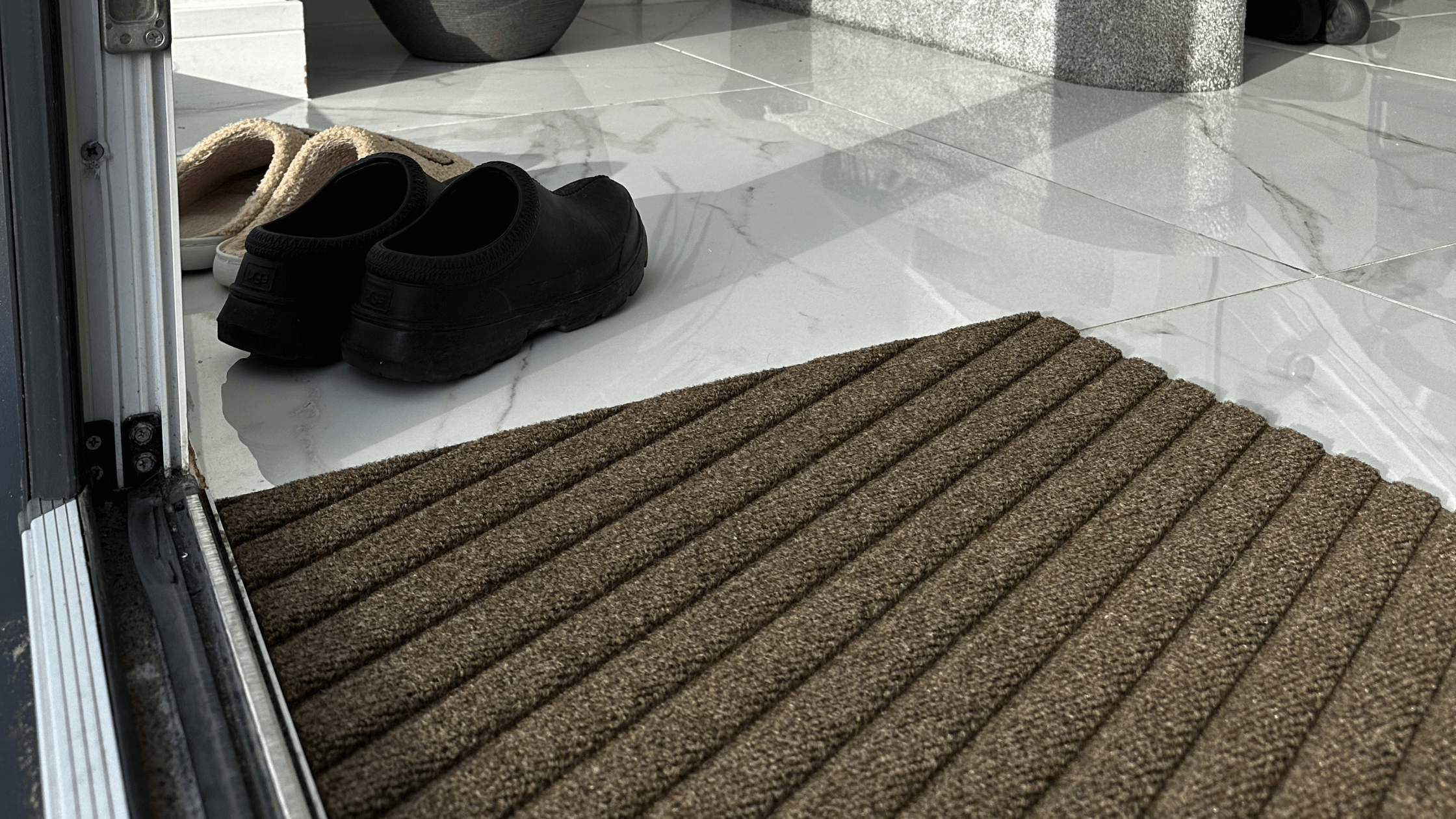 Can You Put a Doormat in the Washing Machine? Here's What Experts Say